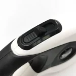 Mécanisme de contrôle ergonomique noir et blanc, design moderne et fonctionnel.