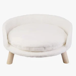 Lit pour animal rond, blanc et confortable au design moderne, parfait pour les intérieurs élégants.