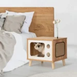 Maison moderne pour chat en bois, design minimaliste et fonctionnel, confort et esthétique réunis.