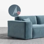 Canapé bleu moderne au design minimaliste, parfait pour un salon contemporain et élégant.