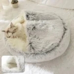 Lit circulaire douillet gris avec un chat endormi, parfait pour le confort des animaux.