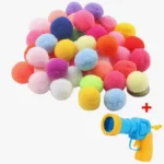 Pistolet coloré pour lancer des pompons amusants, idéal pour le jeu et la créativité des enfants.