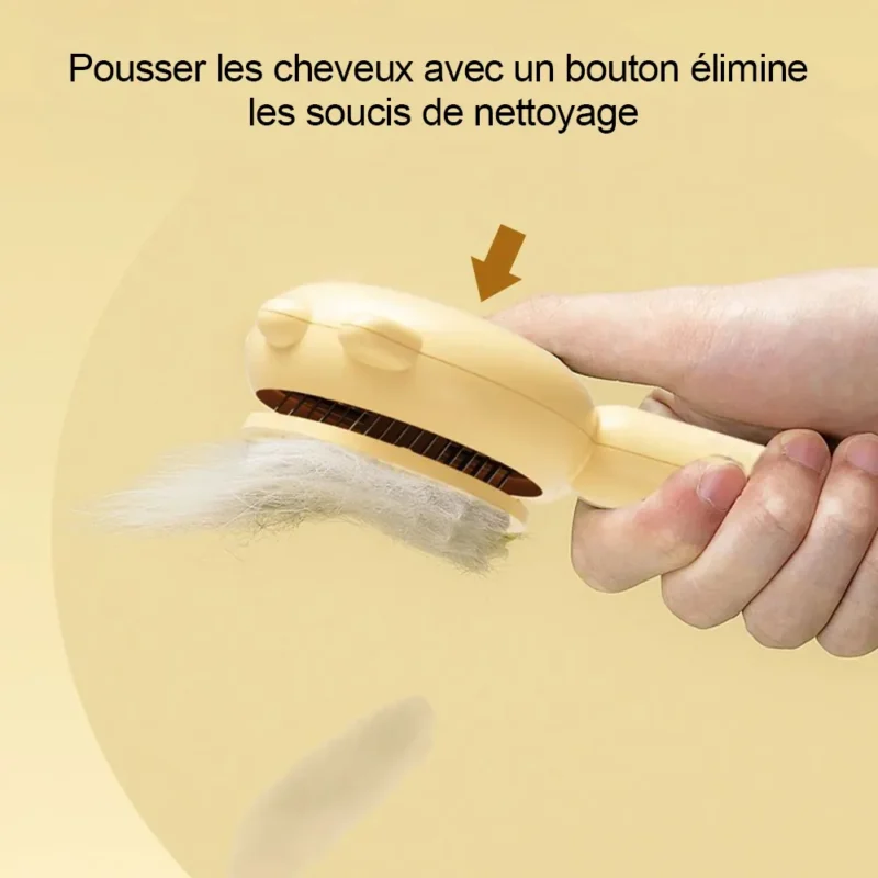 Outil de toilettage jaune ergonomique avec bouton pour un nettoyage facile et efficace.