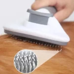 Brosse ergonomique pour animaux, idéale pour le toilettage des chiens et des chats.