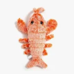 Jouet en peluche homard orange, doux et amusant, idéal pour câliner ou décorer.