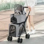 Poussette moderne grise pour petits chiens, idéale pour des promenades confortables en plein air.