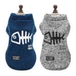 Sweaters pour chiens en bleu marine et gris, motifs poissons, confortables et stylés.