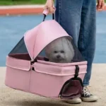 Transporter pour petit chien rose, confortable et stylé, parfait pour les sorties en nature.