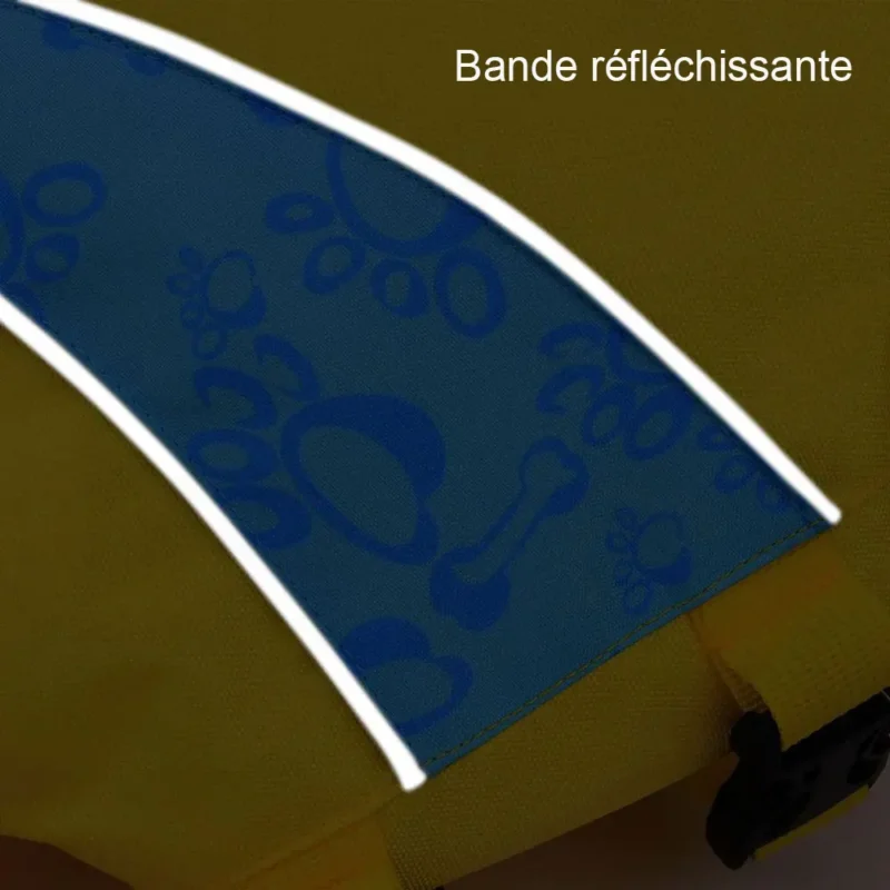 Gilet réfléchissant jaune pour chiens avec motifs pattes et os, sécurité et style garantis.