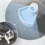 Fontaine deau moderne bleu pour chat, design élégant et confortable sur tapis gris.