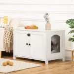 Meuble blanc élégant avec espace pour chat, alliant praticité et décoration moderne.