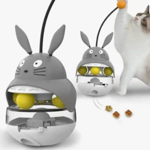 Jouet interactif en forme de lapin pour chats, avec boules colorées et friandises.